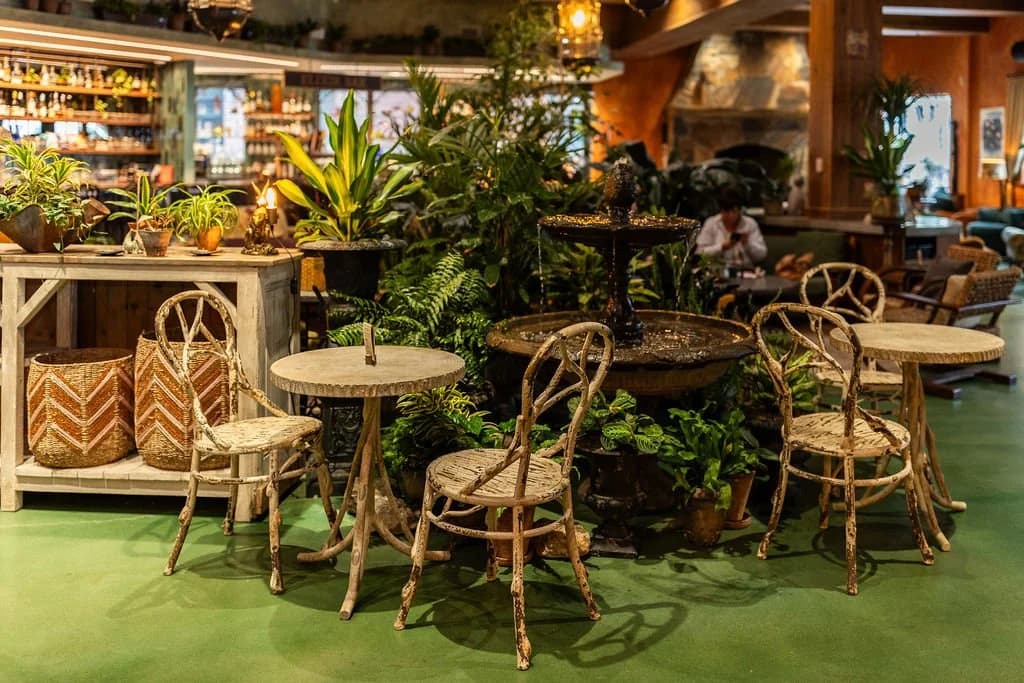 Hearth Food Garden, fountain, bistro chairs, counter and fire