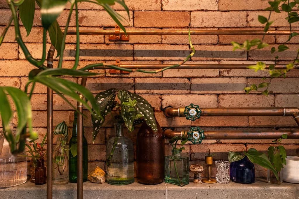 Hearth Food Garden, Lush Life in brick and copper